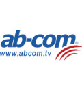 AB COM